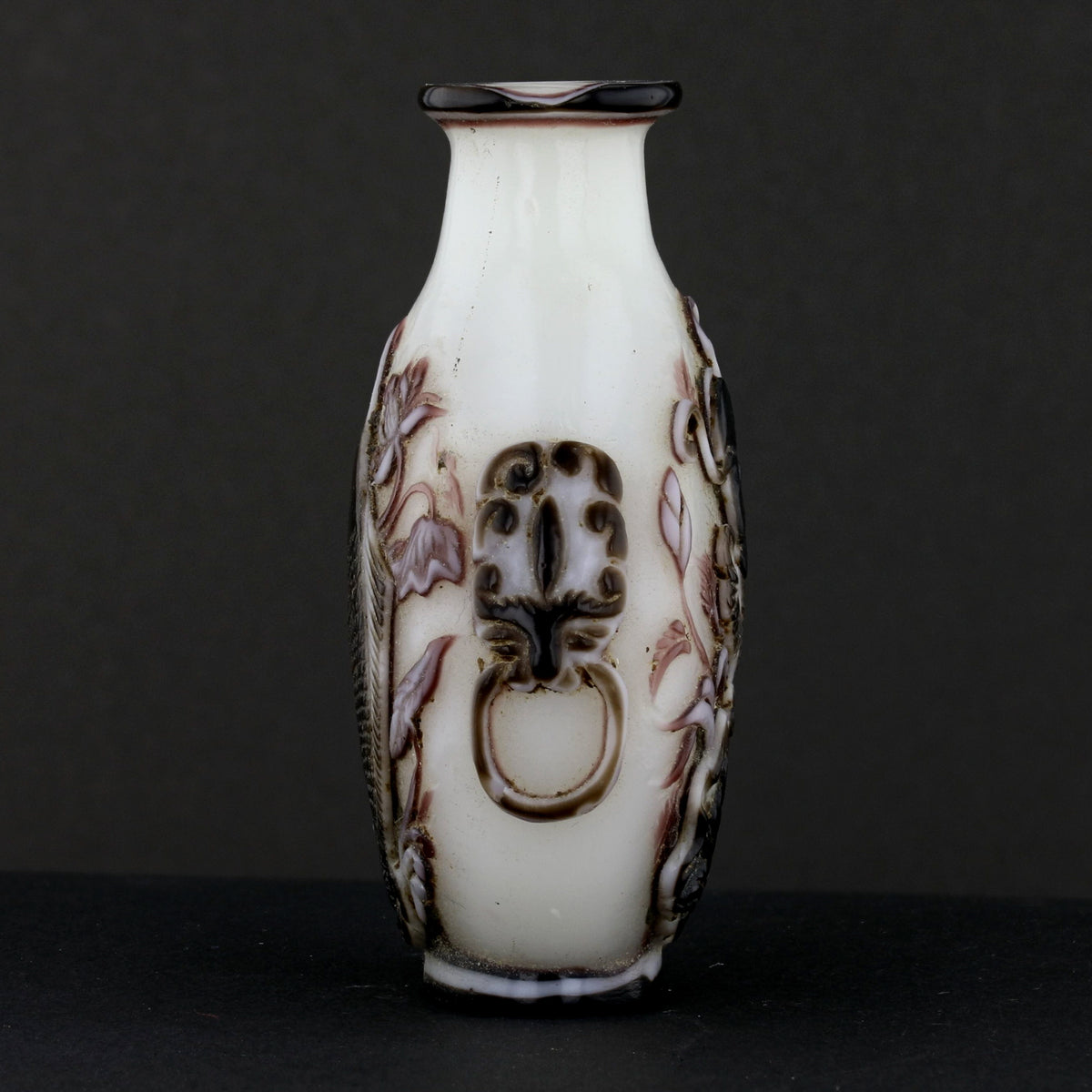 Antique Chinese Snuff Bottle with Hand Embossed Designs