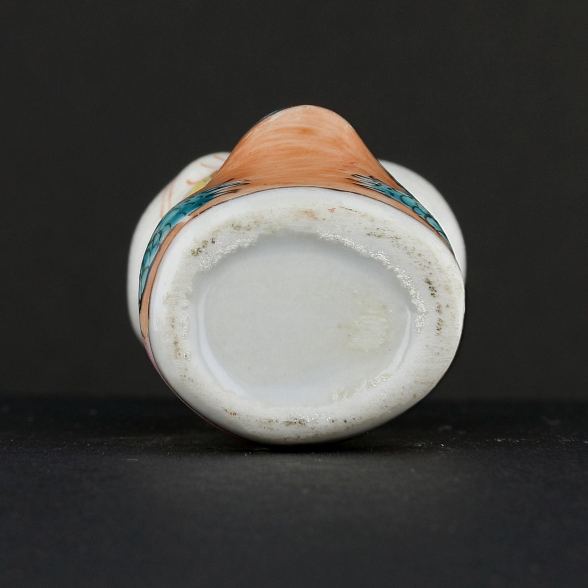 Antique Chinese Porcelain Snuff Bottle – Seated Figure with Red Stopper