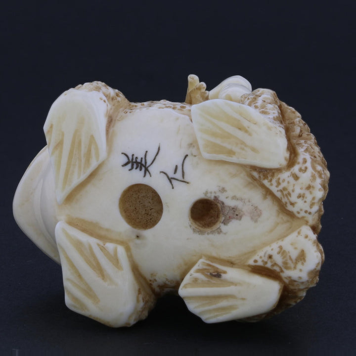 Antique Netsuke Carving – Man Riding a Toad