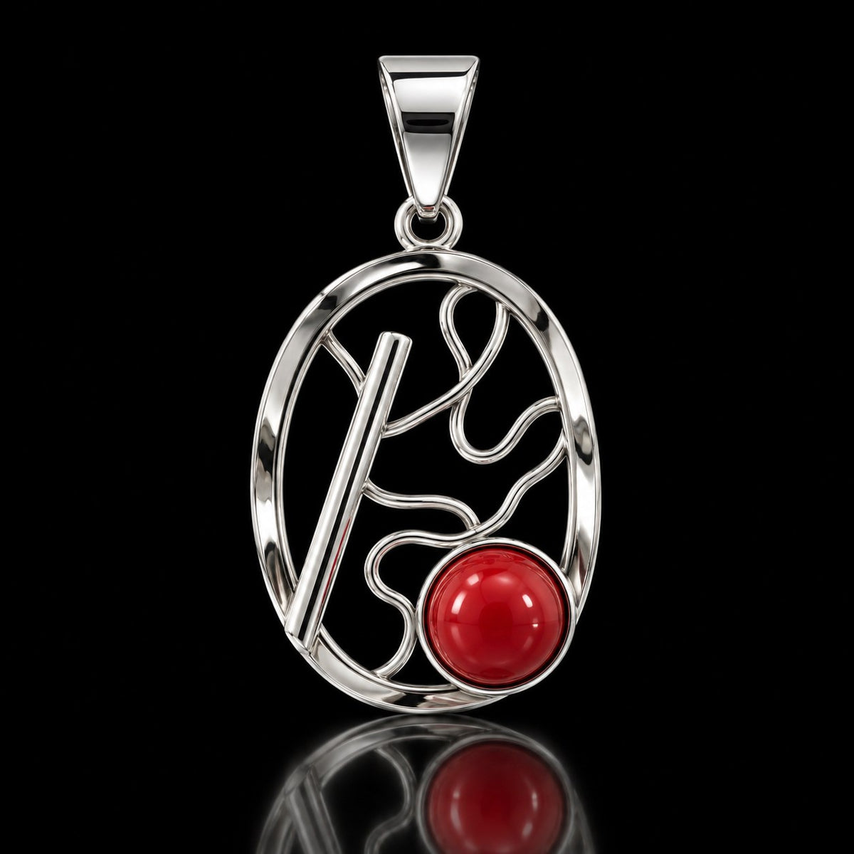 Abstract open oval sterling silver pendant with a round red coral stone. Item 894016.
