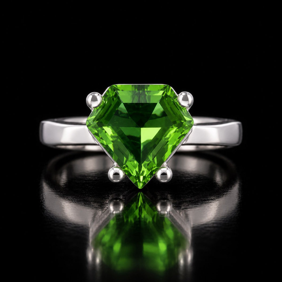 The same VooDooStone ring turning peridot green under fluorescent light, front view. Item 894787.
