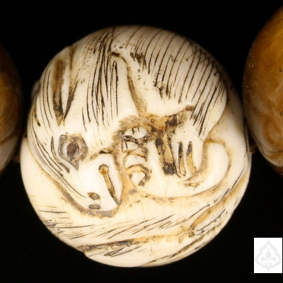 One of the netsuki beads close up