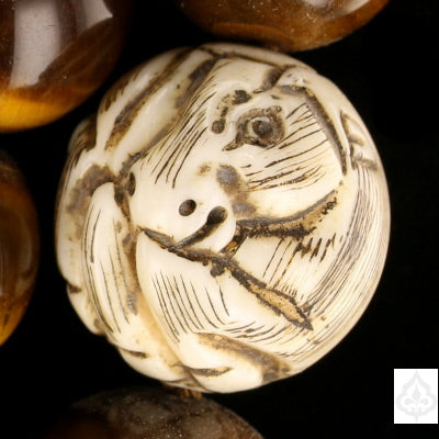 One of the netsuki beads close up