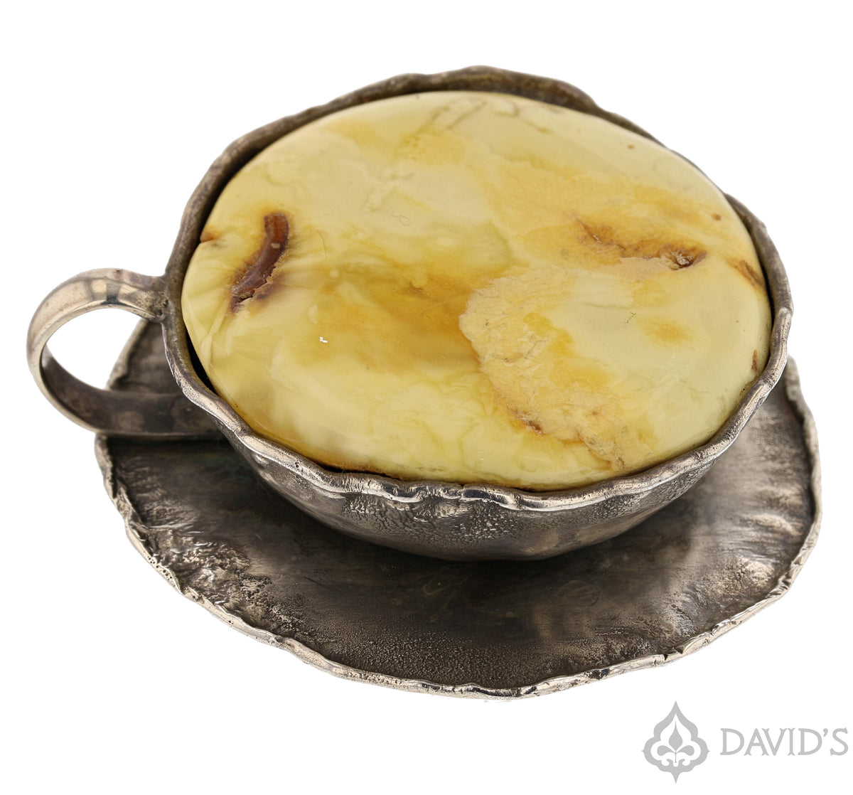 Top down view of amber cup of tea ring