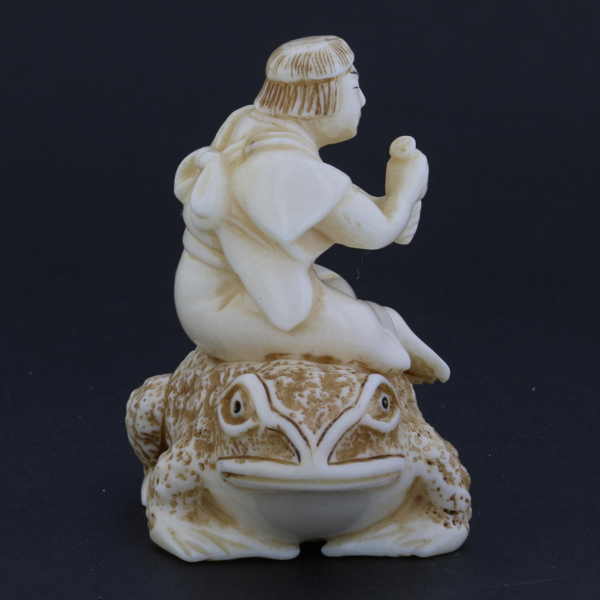 Antique Netsuke Carving – Man Riding a Toad