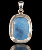 Carved aquamarine sterling silver pendant, back of the bezel. Item 893570.
