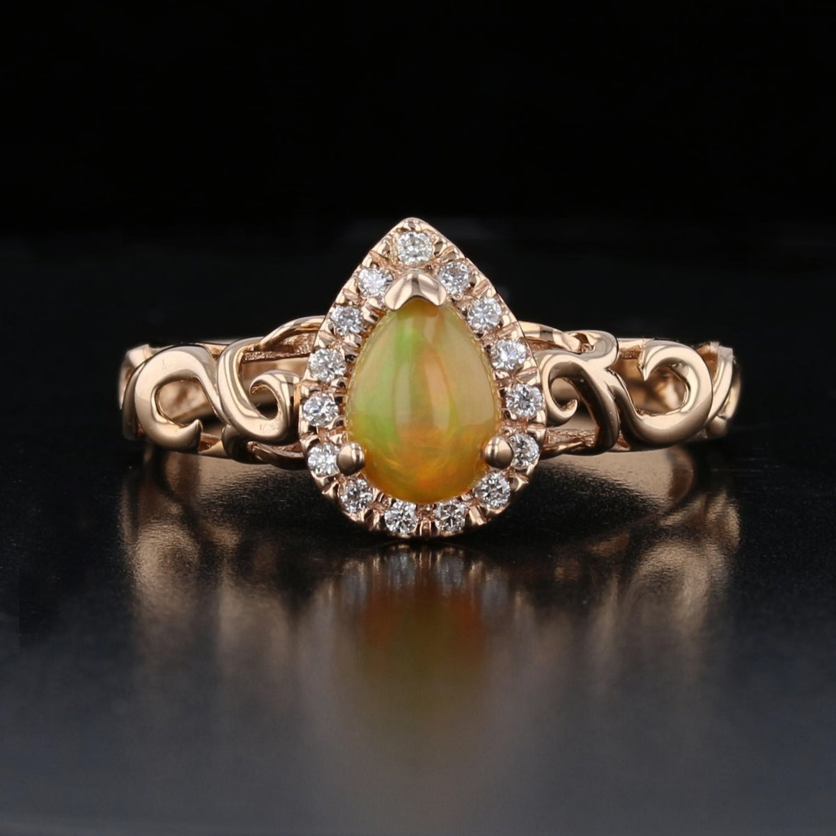 Opal and Diamond Halo Ring