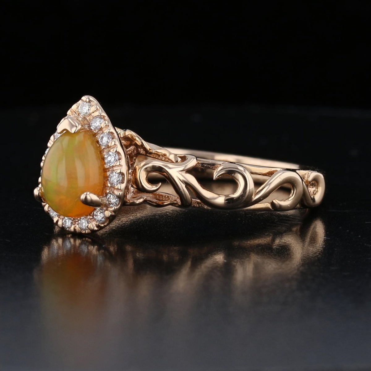 Opal and Diamond Halo Ring