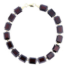 Garnet line bracelet on a white background. Item 894562.