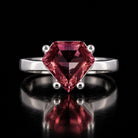 Sterling silver VooDooStone shield-cut ring, purplish-pink in daylight, front view. Item 894787.