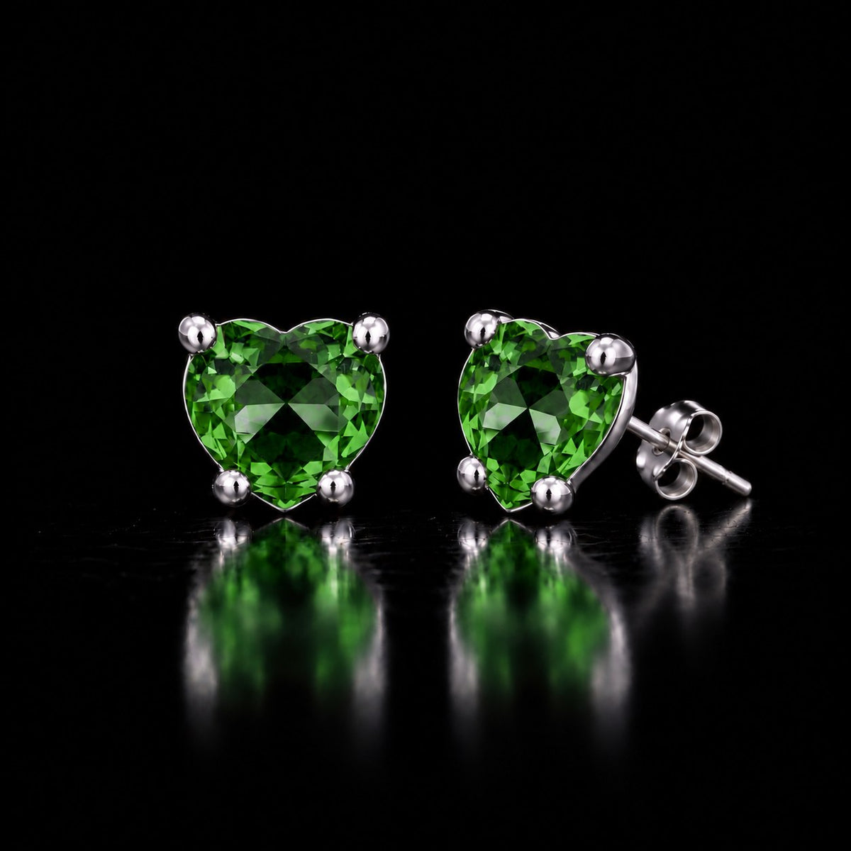 The same VooDooStone heart-cut stud earrings turning peridot green under fluorescent light. Item 894788.