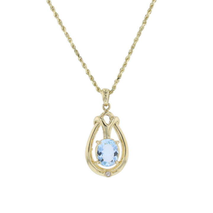 Knot Design Aquamarine Gold Pendant