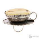 Side view of Amber cup of tea ring