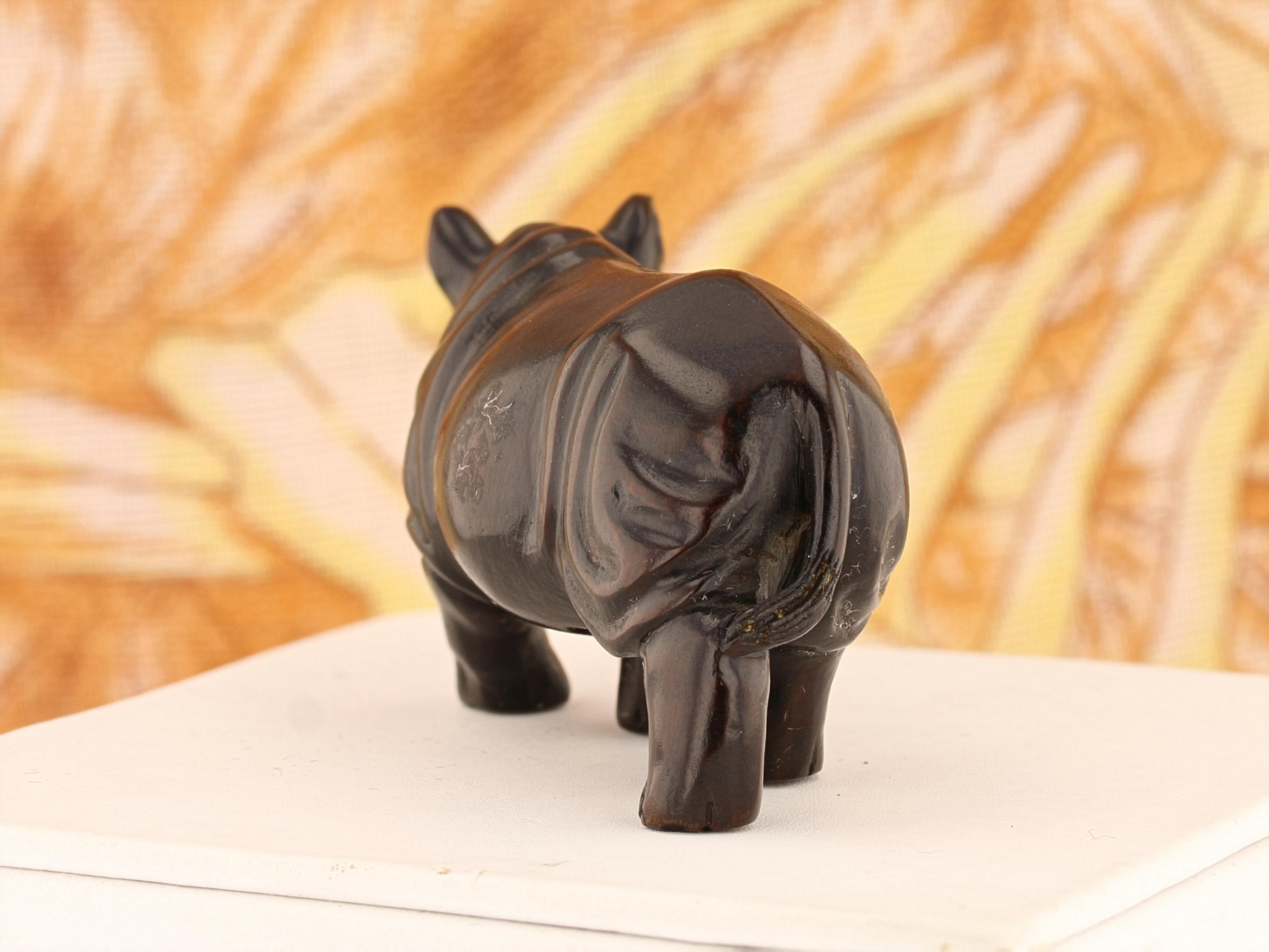 Regal Rhinoceros Dark Wood Netsuke - David's Antiques & Jewelry