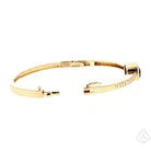 opened up bracelet lying on it's side 