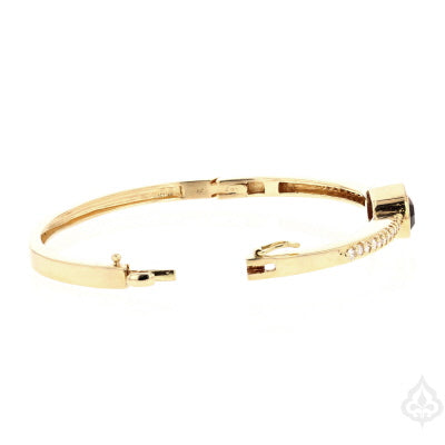 opened up bracelet lying on it's side 