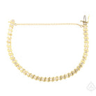 View of the opened bracelet, extended as far as the safety chain allows 